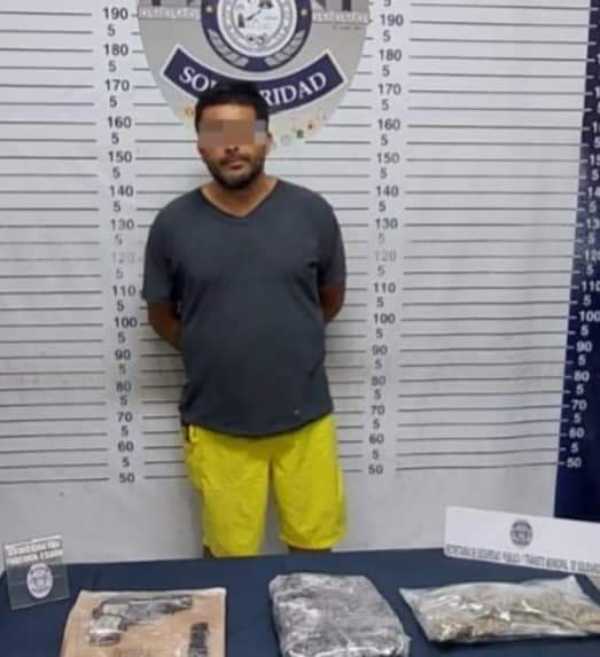 DETENIDO CON ARMA Y MOTA